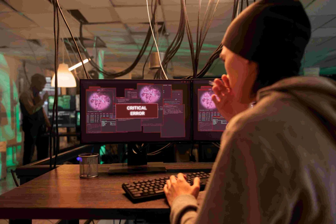 compressed_asian-criminal-accessing-computer-system-database-2023-11-27-05-02-05-utc-1