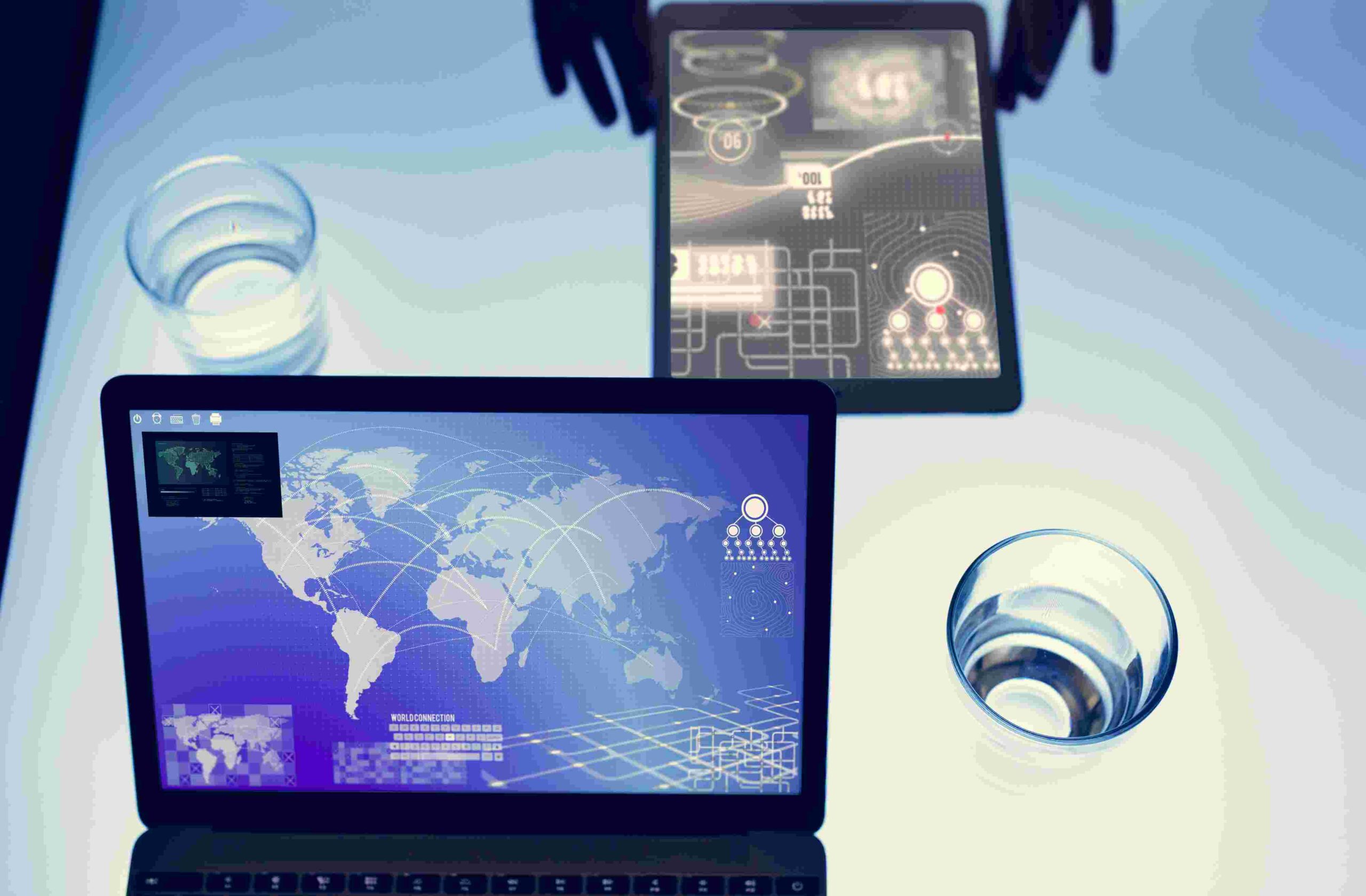 compressed_hands-using-tablet-on-a-cyber-space-table-2023-11-27-04-55-48-utc
