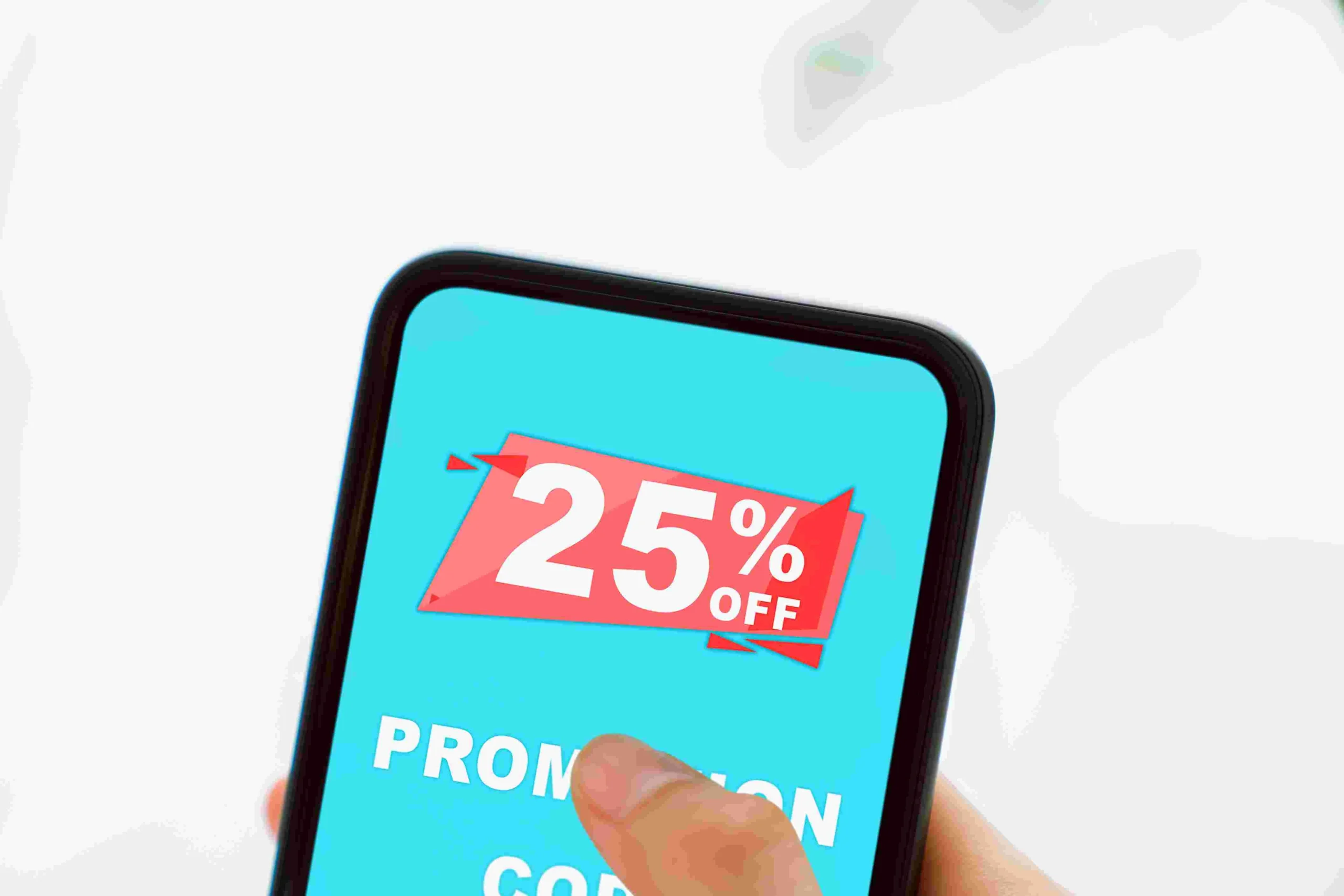 compressed_woman-holding-smartphone-to-enter-the-code-to-get-2023-11-27-05-00-33-utc